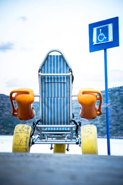 istock Beach wheel chair for disabled swimmers, Elounda, Crete, Greece 853185136