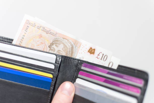 istock 2017 design £10 note - UK Currency in a wallet 853187938