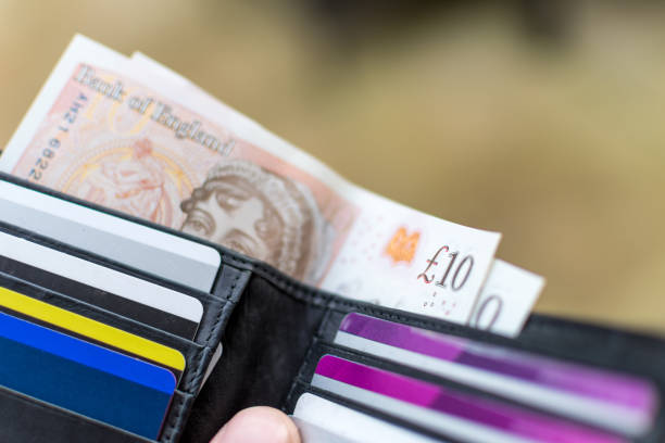 istock 2017 design £10 note - UK Currency in a wallet 853188378