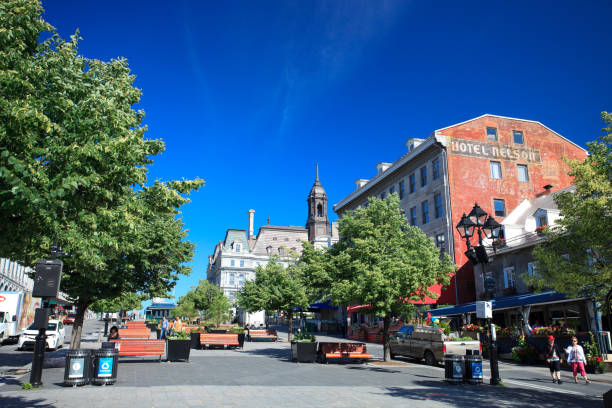 Old Montreal The Old Montreal (Vieux-Montréal), Place Jacques Cartier is the famous evening gathering, especially people come around to enjoy gastronomic events. place jacques cartier stock pictures, royalty-free photos & images