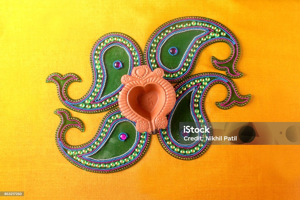 Rangoli Design Around Diwali Lamp Stock Photo - Download Image Now - Asia,  Bright, Celebration - iStock