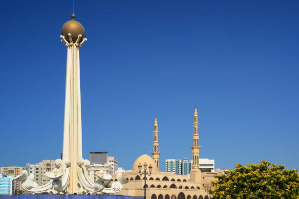 Al Ittihad Park and King Faisal mosque in Sharjah. stock photo