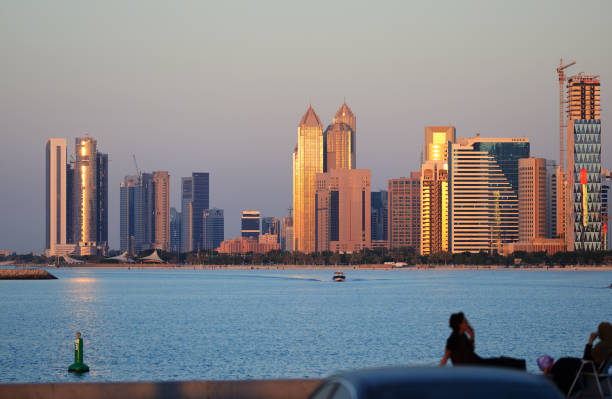 istock Abu Dhabi cityline at sunset. 853226340