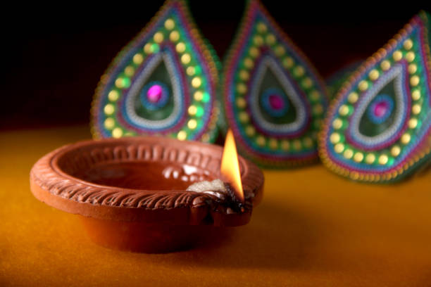 istock Rangoli design around Diwali lamp 853227544