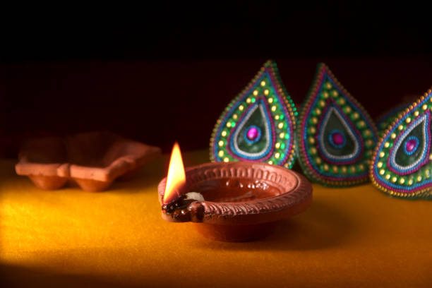 istock Rangoli design around Diwali lamp 853227932