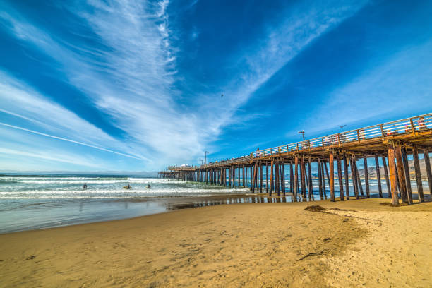 istock Surfers by the Pier in Pismo beach 853238538