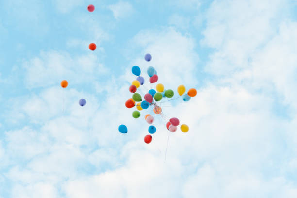 multicolored balloons - paper wind form shape imagens e fotografias de stock