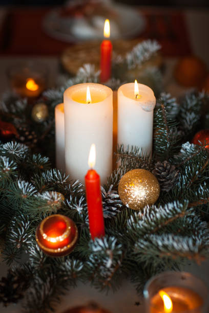 istock Burning candles in a Christmas decoration 853247952