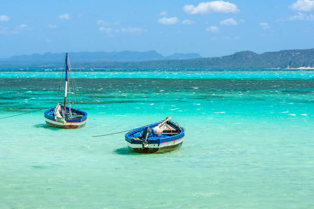 Traditional fishing boats Traditional fishing boats in the Emeral sea of Antsiranana bay (Diego Suarez), north of Madagascar. madagascar beach photos stock pictures, royalty-free photos & images