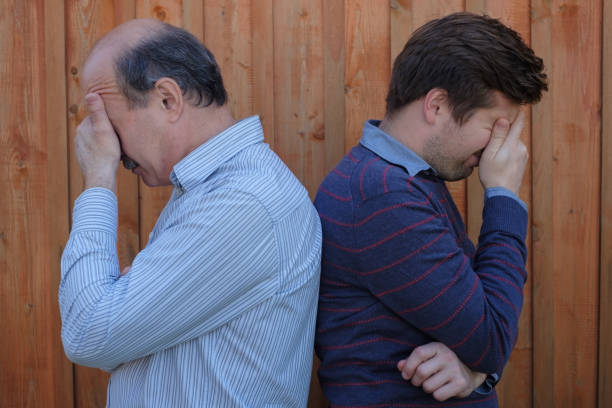 portrait of an elderly father and son - life events only senior men horizontal head and shoulders imagens e fotografias de stock