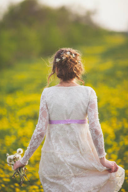 istock Newlywed  bride  in the field 853264042