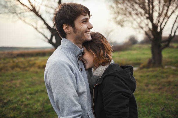 istock Heterosexual couple walking on the field 853264602