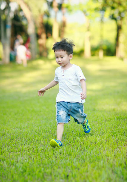 istock Cute children playing in the park 853271366