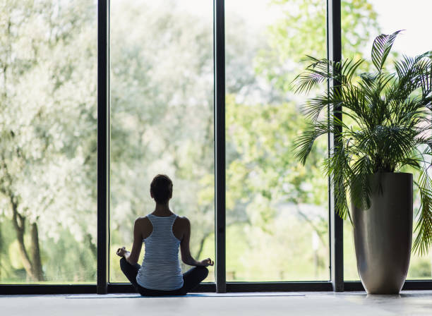istock Young woman practicing yoga. Meditation and harmony concept 853271460