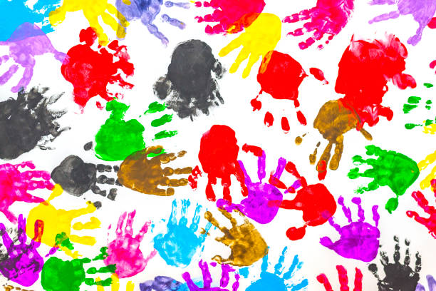 istock Colorful children hand prints on white background 853298844