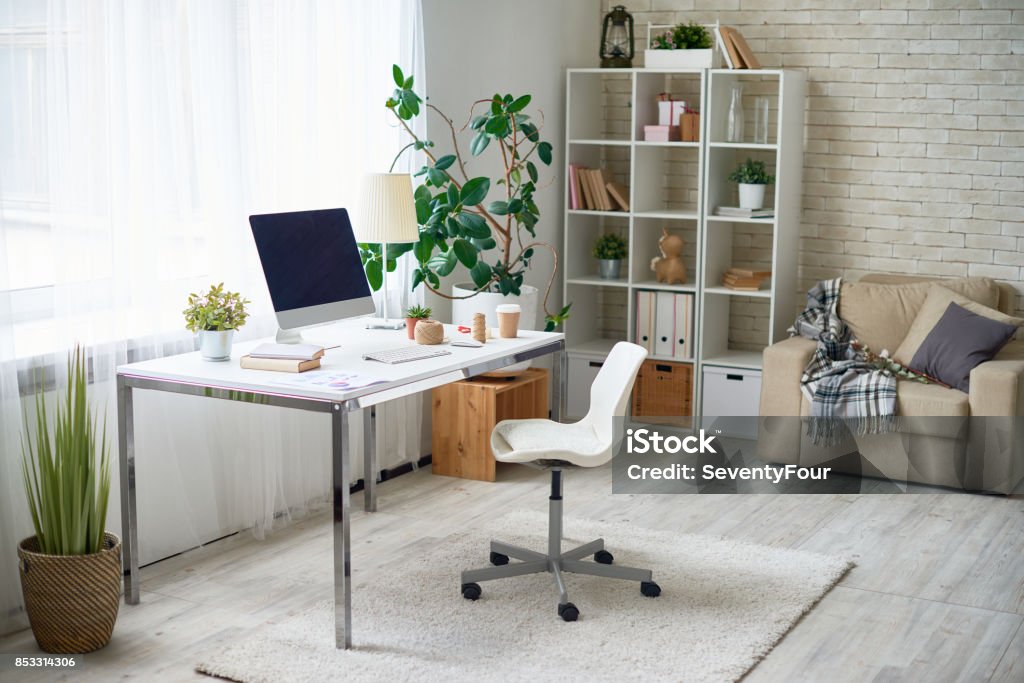 Modern Home Office Background image of empty office space in cozy apartment with modern Scandinavian design Home Office Stock Photo