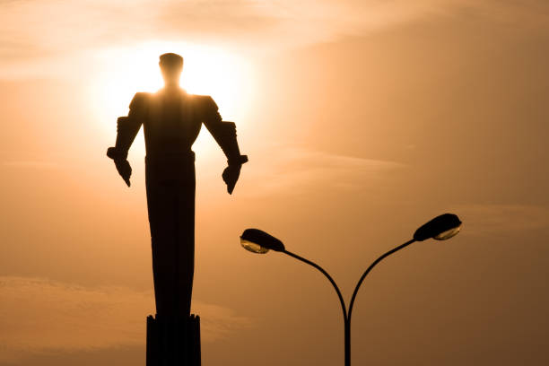 A monument to cosmonaut Yuri Gagarin in Moscow at sunset. Silhouette of the monument against the background of the setting sun