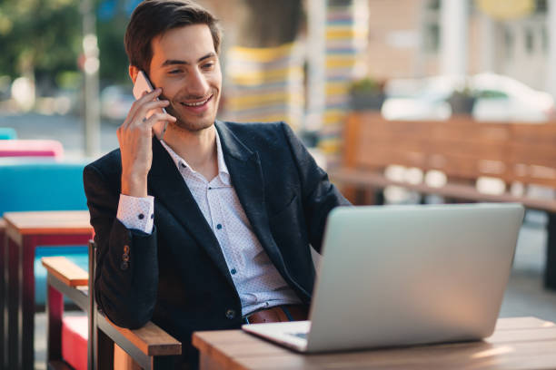 istock Young entrepreneur working on laptop and phone 853331154