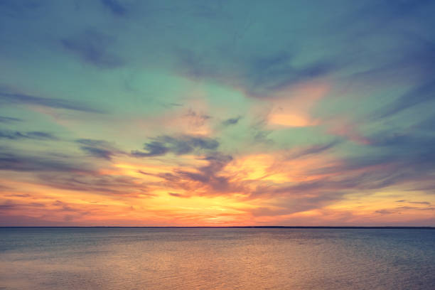 istock Aerial panoramic view of sunset over ocean 853337780