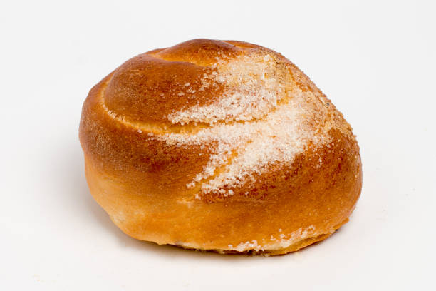istock Sweet cinnamon bun roll swirl isolated over the white background 853350648