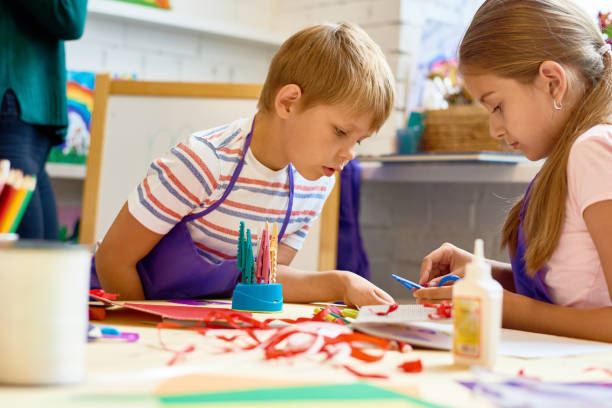 istock Children Doing Handmade Crafts in School 853362240
