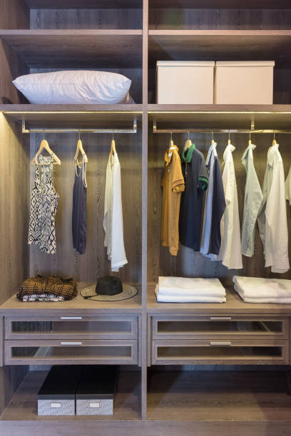 istock wooden wardrobe in walk in closet 853364928