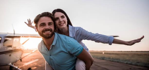 istock Couple and aircraft 853370116