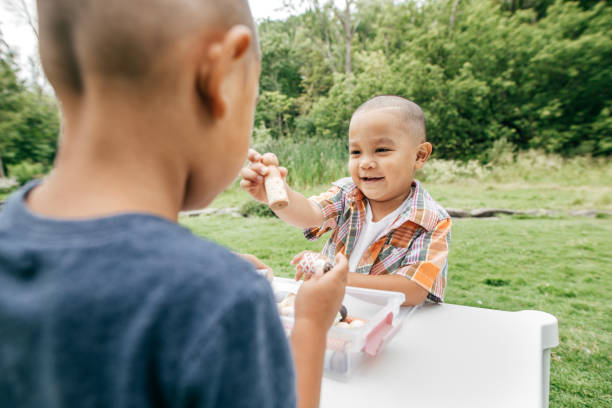 istock Playing with brother outdoor 853375154