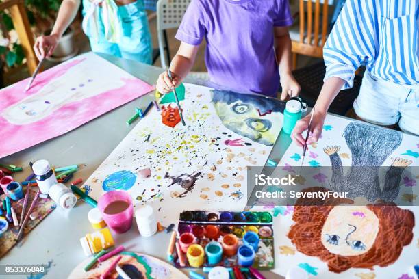 Hands Of Children Painting In Art Class Stock Photo - Download Image Now - Child, Painting - Activity, Painting - Art Product