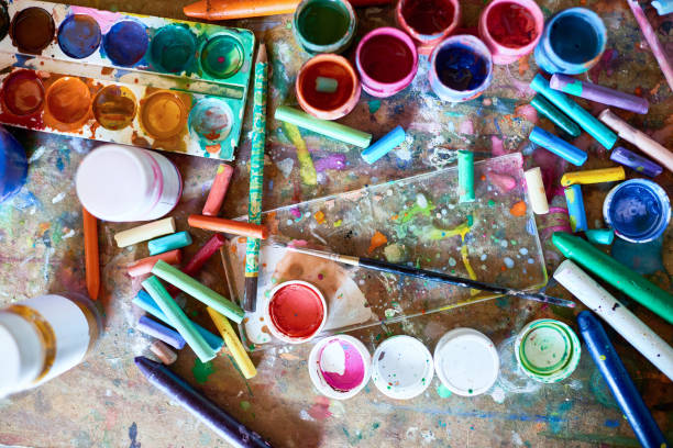 istock Art Supplies on Wooden Table 853376934