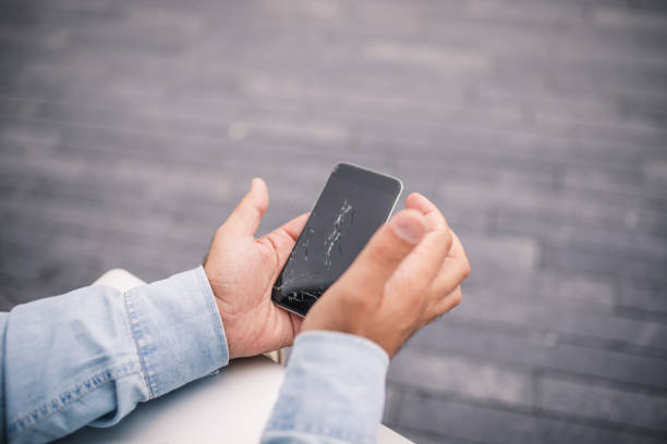 istock Senior man holding his phone 853387476