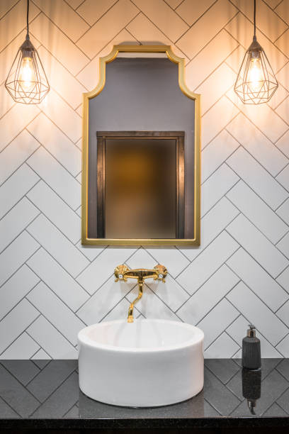 istock Sink mirror and lamps in luxury toilet 853389824