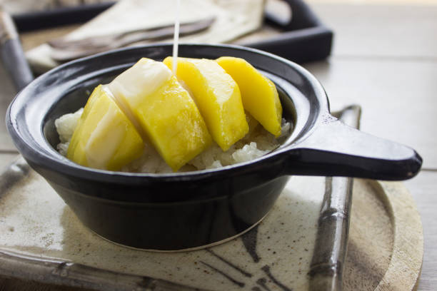 istock Mango Sticky Rice In a black cup , Thai dessert 853413902