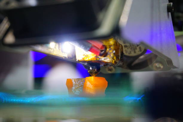 istock 3D printing machine detail in action 853431054