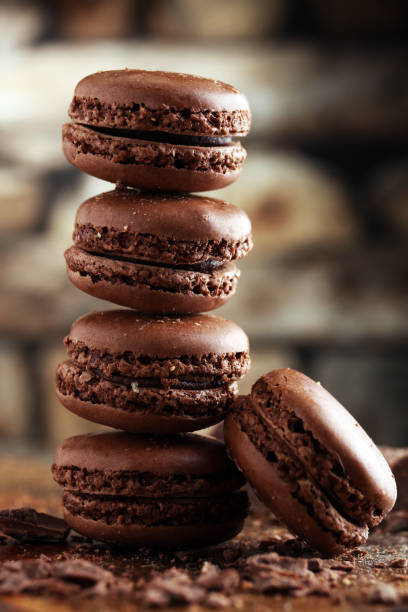 istock macarons sweet chocolate macaron French on wooden table 853431436