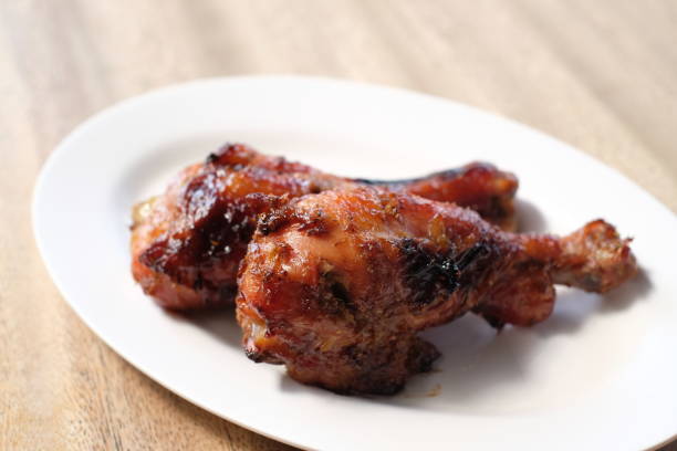 istock Roasted Chicken Herbs in white dish - soft focus 853447526