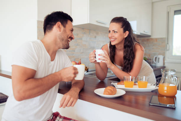 istock Young couple relaxing at home 853452778