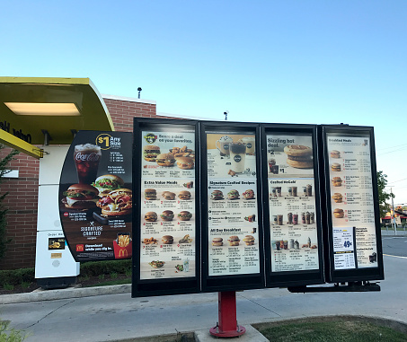 Pittsburgh, USA - September 24, 2017   McDonald's drive thru menu board in Allison Park just north of downtown Pittsburgh.  iPhone