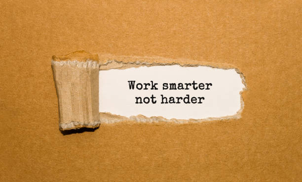 istock The text Work smarter not harder appearing behind torn brown paper 853456762