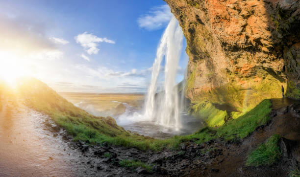 istock Hiker at Seljalandsfoss Waterfall in Iceland 853460738
