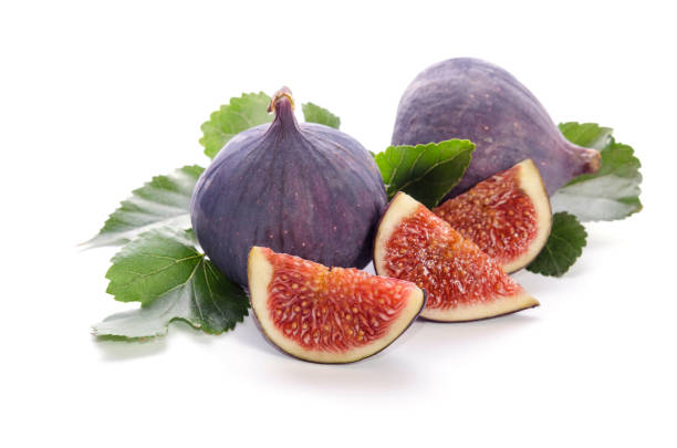 istock fruits of Fig tree (whole and part) with leaves isolated on white 853461082