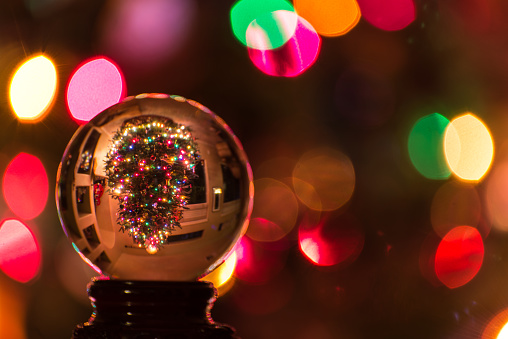 Image of Christmas tree through crystal ball