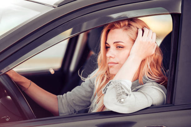 istock Woman in car 853462074