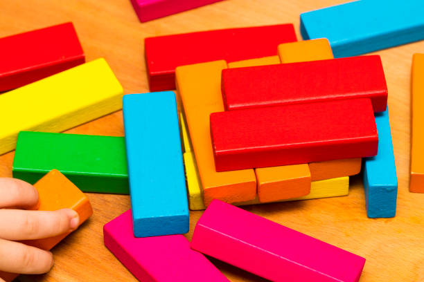 istock Scattered heap of toy colored wooden bricks 853479006