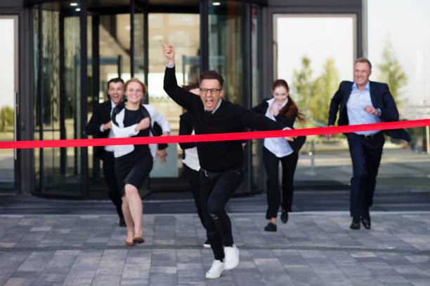 istock Business people crossing the finish line 853479144