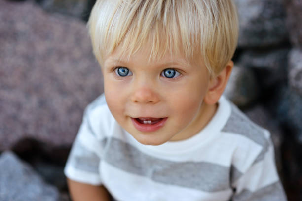 istock Cute boy with blond hair 853485172