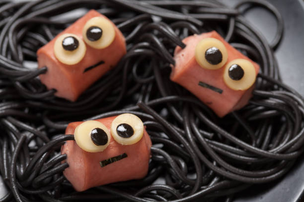 Sausage and spaghetti funny spiders for Halloween kids lunch