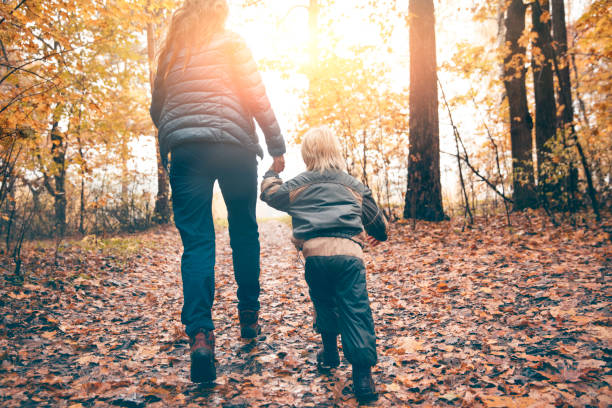 istock Mother and child in the park 853503598