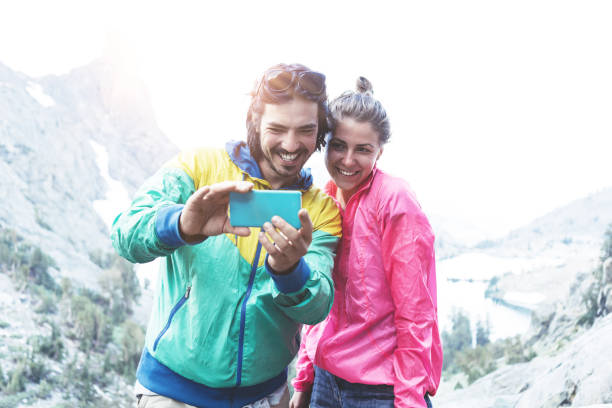 istock Happy couple taking self portrait in mountains 853515120