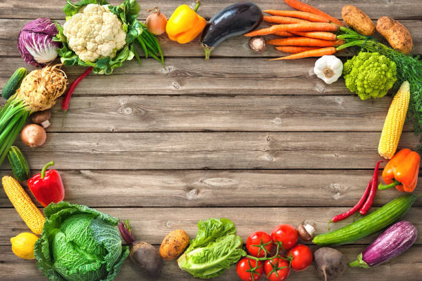 istock Fresh vegetables on wooden background 853517258
